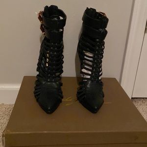 Privileged black booties/Heels.